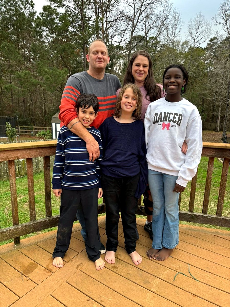 Marsha with her husband and three children